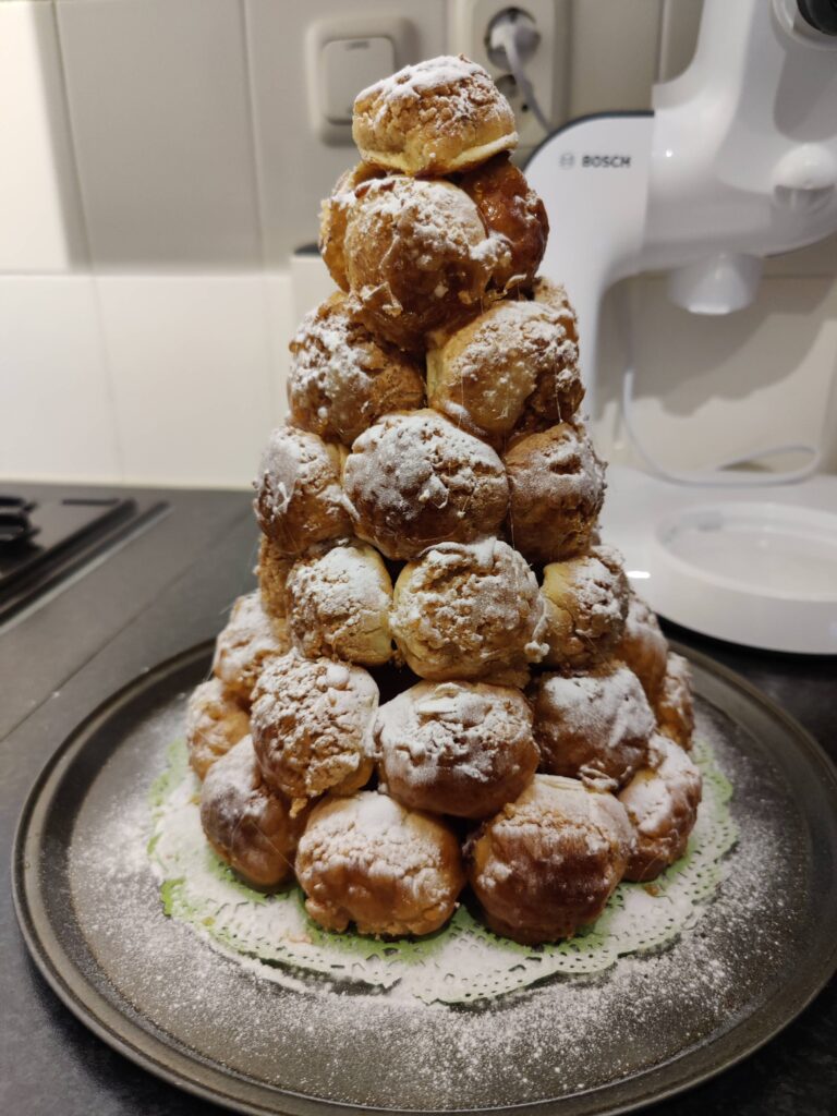 croquembouche with powdered sugar on top