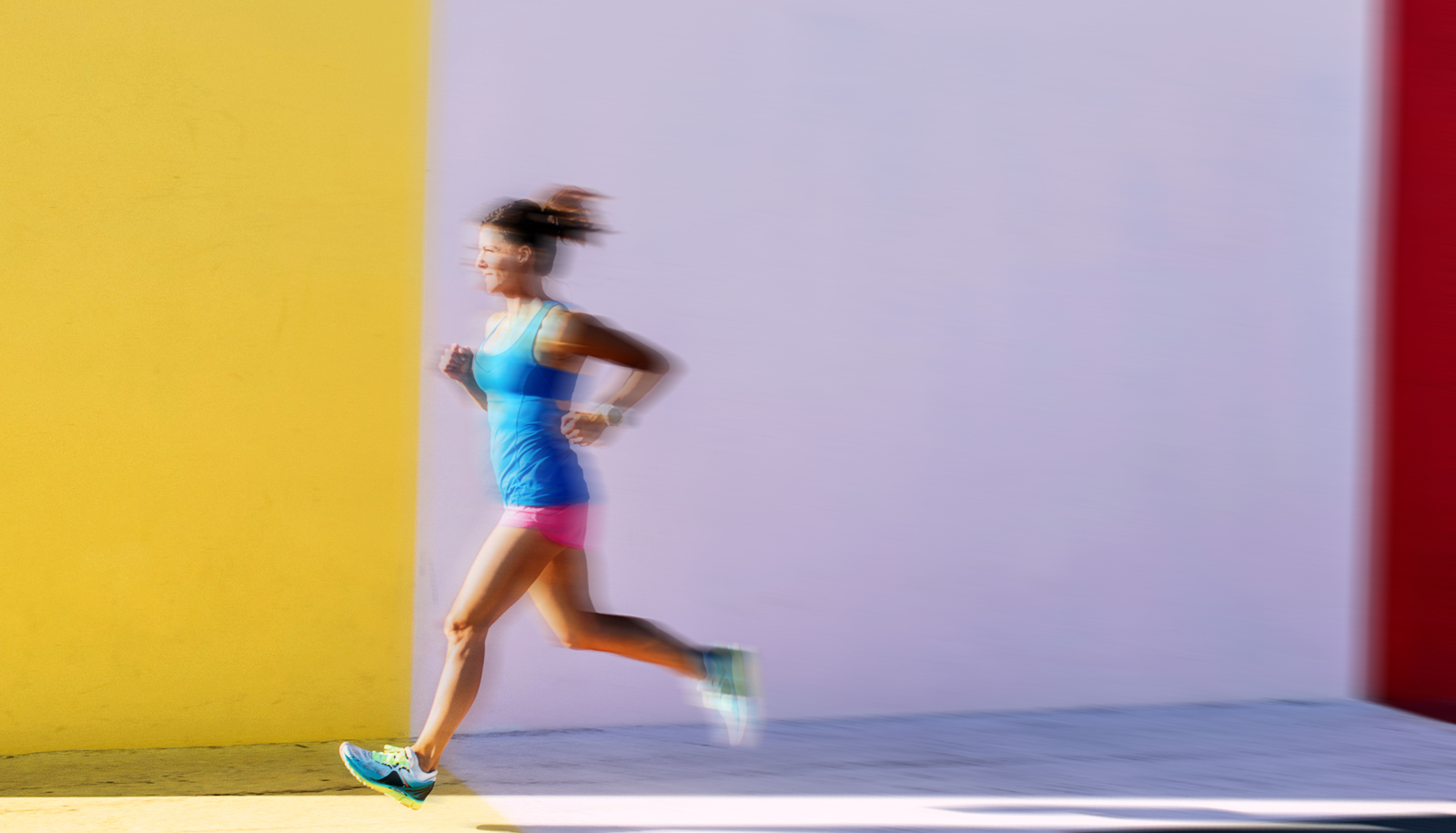 Woman running with motion blur applied